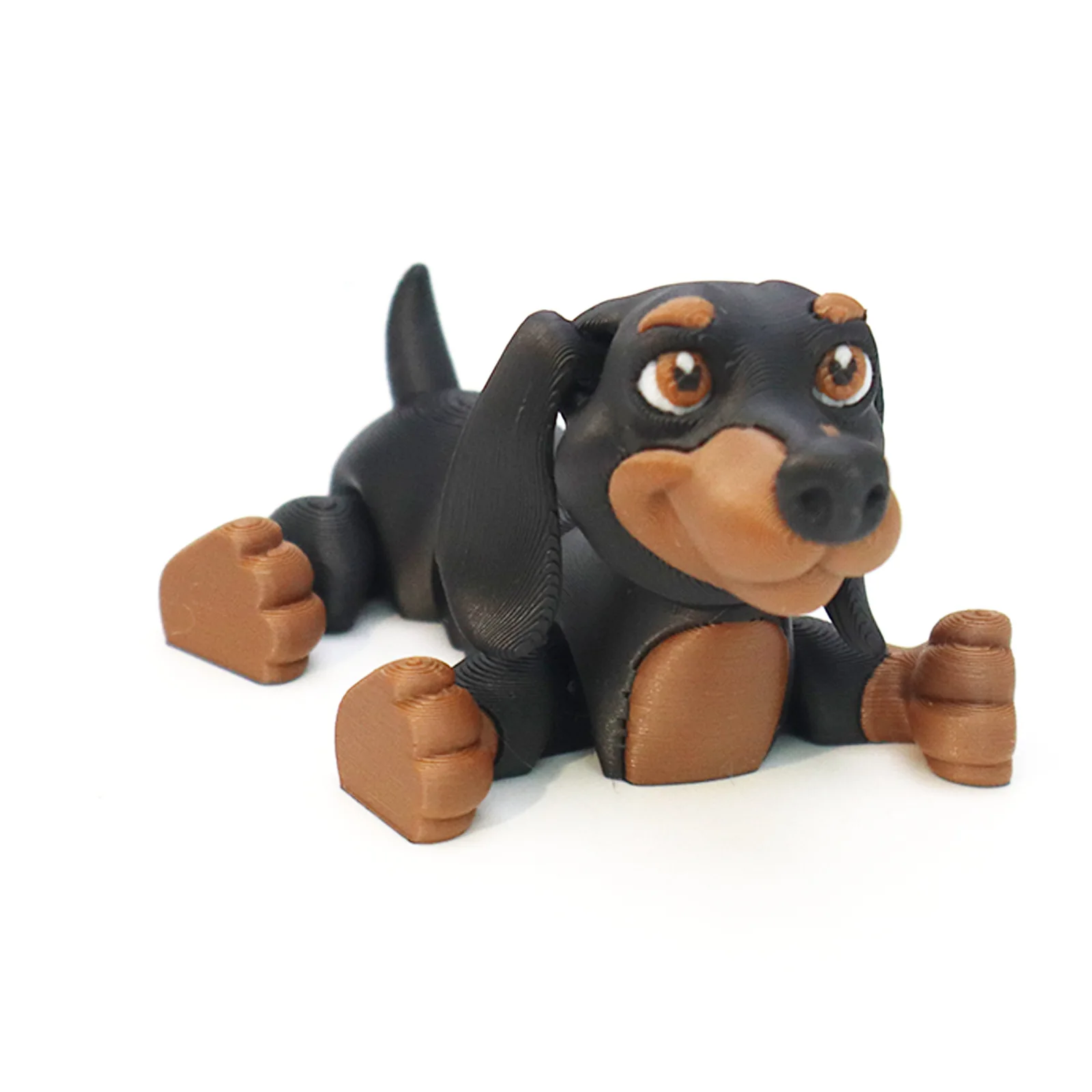 Miniature 3D black and tan Dachshund dog toy figurine showing 4-inch product dimensions for home shelf and office desk decor.