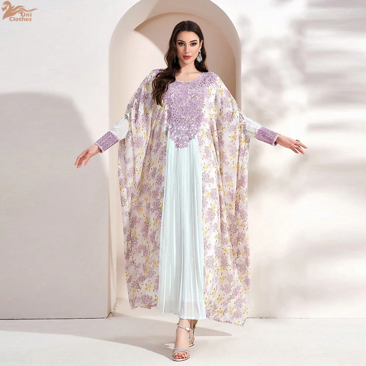 Uni Dubai فساتين أنيقة بأكمام تشبه جناح الخفّاش وم...