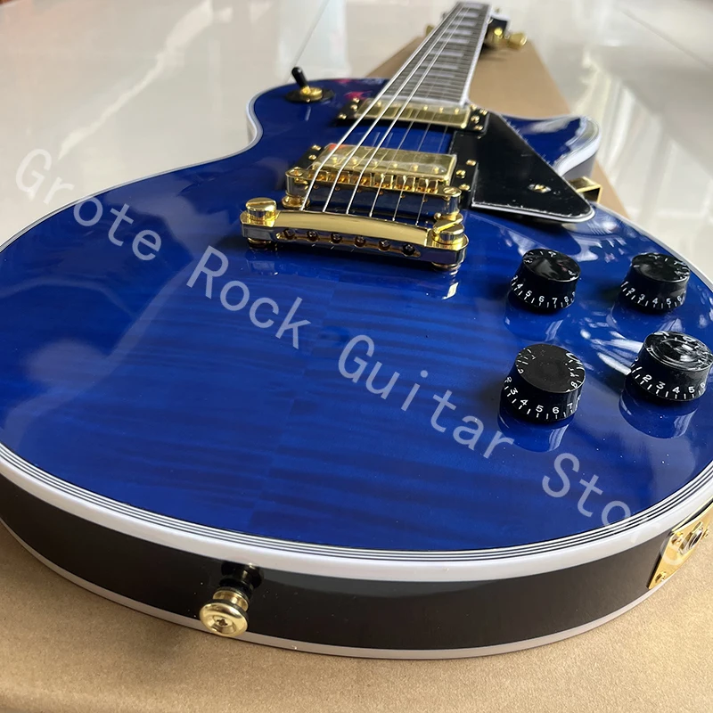 

Classic tiger skin patterned electric guitar, professional level, quality assurance, free door-to-door delivery.