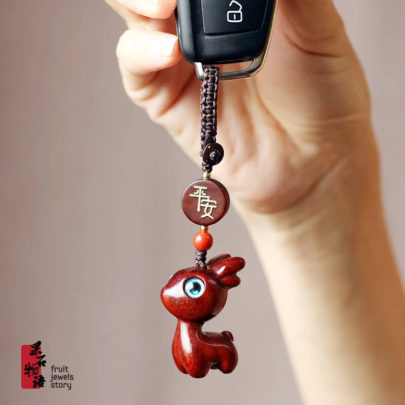 

Cartoon cute sandalwood net red one deer safe men's and women's home car key chain pendant pendant braided mobile phone chain