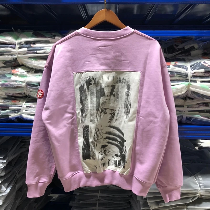 

CAVEMPT C.E Pink Long-sleeved Sweatshirt Japanese Style Men Women 1:1 Ghost Hand CE Patch Round Neck Sweater