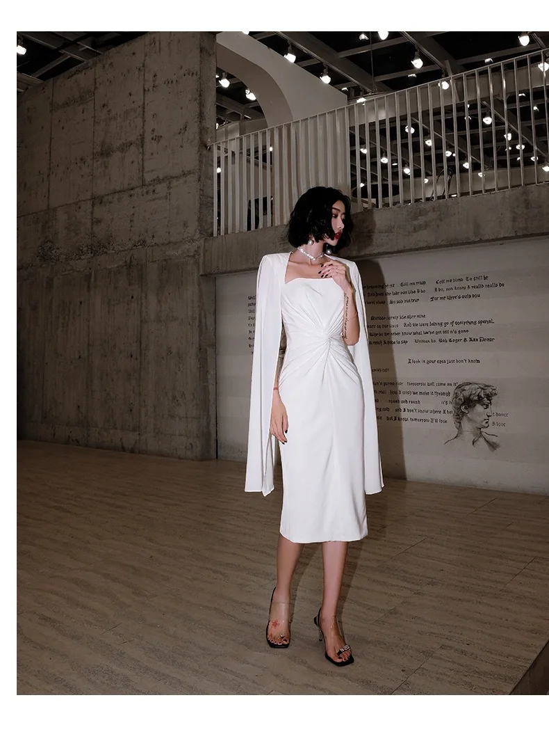 

White little dress 2023 spring and summer new aura banquet host temperament short style simple generous dress