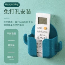 

New creative punch-free paste mobile phone charging storage rack wall-mounted remote control storage box rack