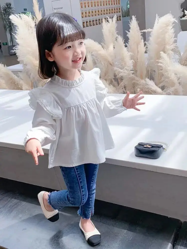 Children's shirt Spring and Autumn long sleeved doll shirt Children's fashionable base Cotton top
