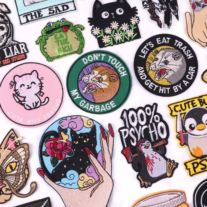 Funny cat iron-on embroidered patches with bold cartoon designs – perfect for jackets, backpacks, and DIY fashion projects