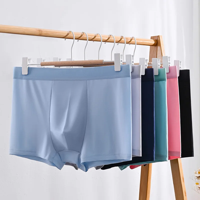 

New Summer Ice Silk Seamless Men's Underwear Solid Color Plus Size Boxer Shorts Men's Mid Waist Breathable Boxer Pants Wholesale