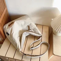 Sac à bandoulière japonais pour femmes et hommes, grands sacs messager en toile pour étudiants, sacs de livres de marque, sacoches à main féminines, 2024 5