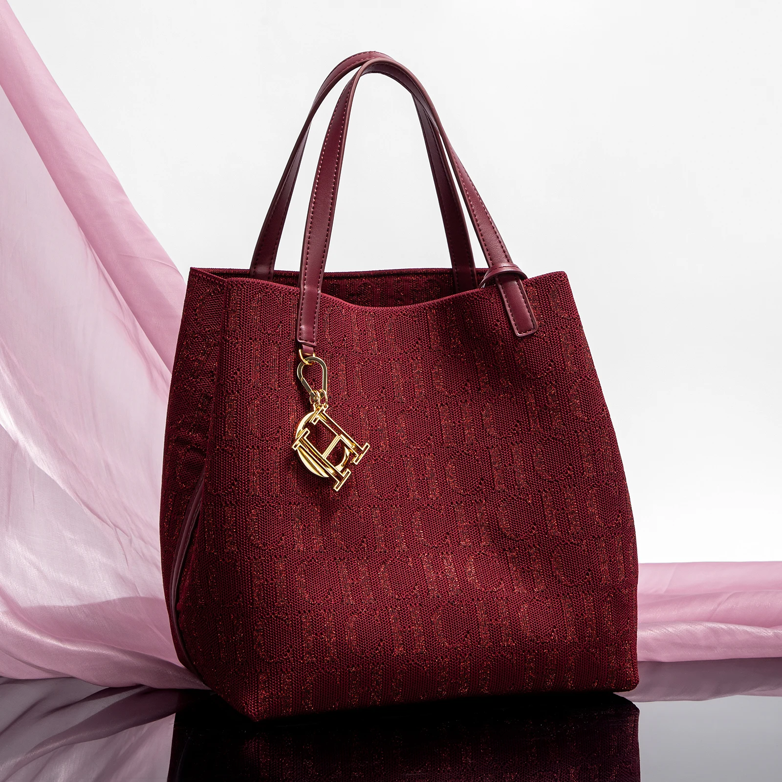 حقيبة دلو نسائية عصرية ذات لون سادة