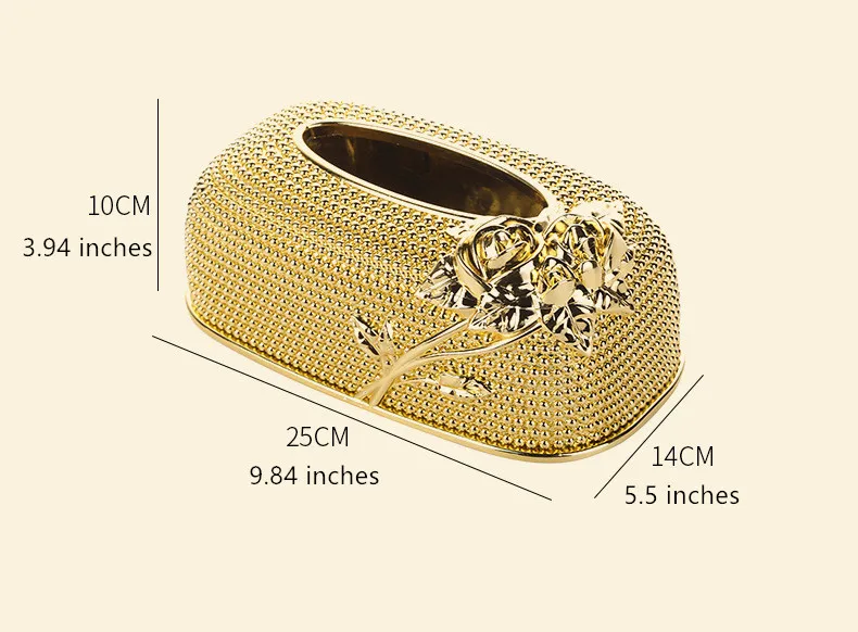 The Blossom Flower Tissue Box, featuring a gold-colored, oblong design with an elegant 3D rose pattern, makes a striking addition to your home decor. Measuring 25 cm (9.84 inches) long, 14 cm (5.5 inches) wide, and 10 cm (3.94 inches) high, this stylish tissue box is both functional and visually appealing.