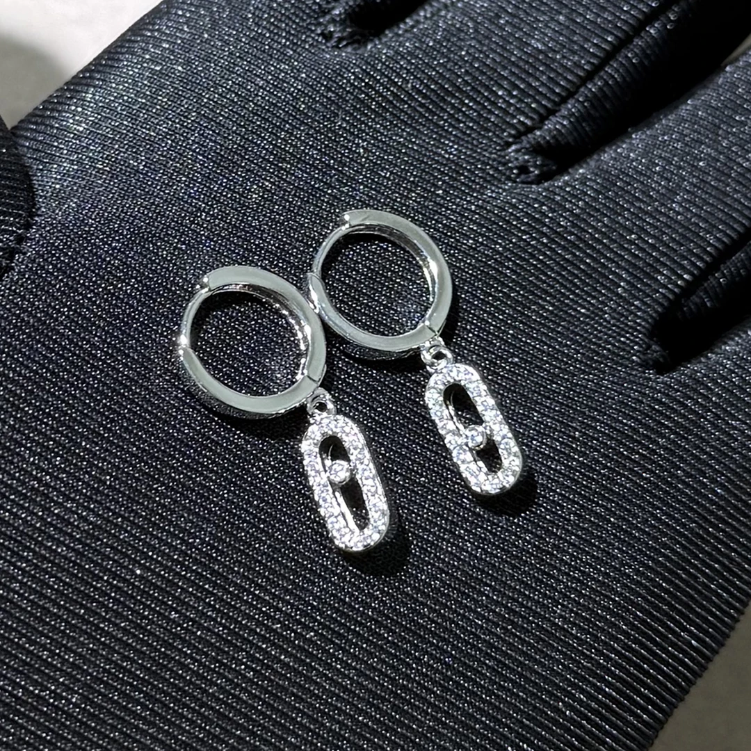 925 sterling silver gold-plated classic single diamond women's earrings. Moving diamonds.