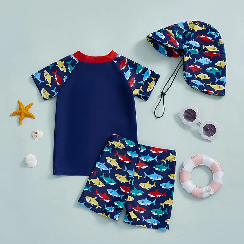 Lioraitiin Toddler Baby Boy 3Pcs Swimsuit Set Shark Print Short Sleeve Rash Guard Swim Tops Shorts Sun Hat Bathing Suit Outfit