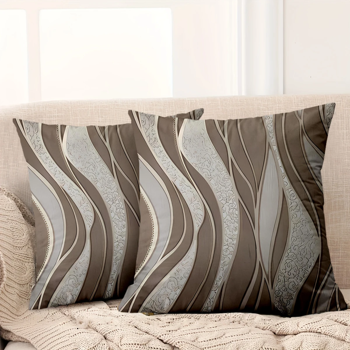Brown and white patterned pillow covers on a bed