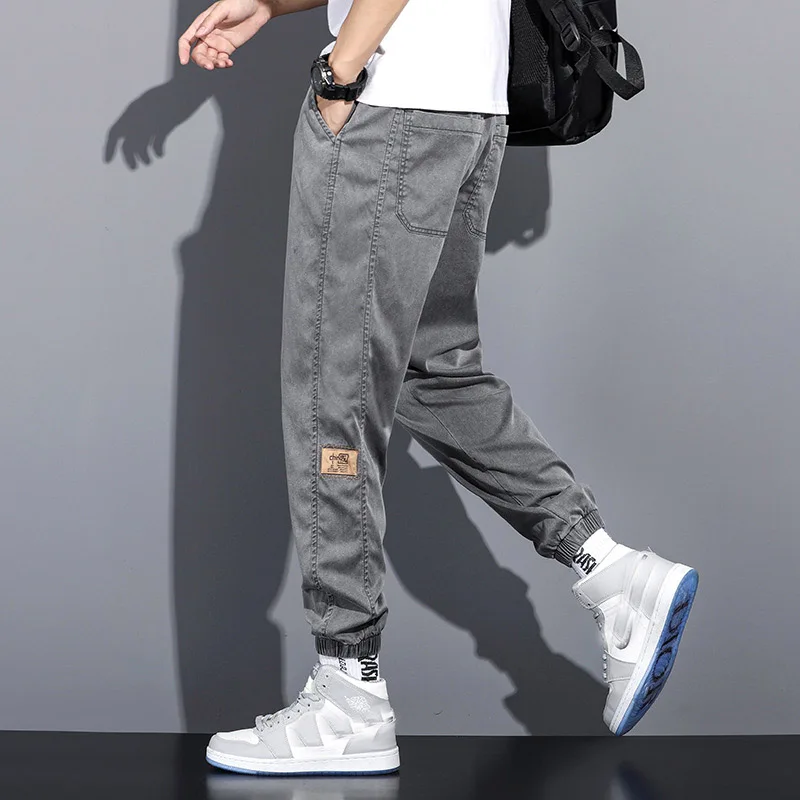 

Plus size Lycra jeans men's summer thin loose drawstring ice silk leisure Harun large size nine-minute long trousers 7XL 8XL