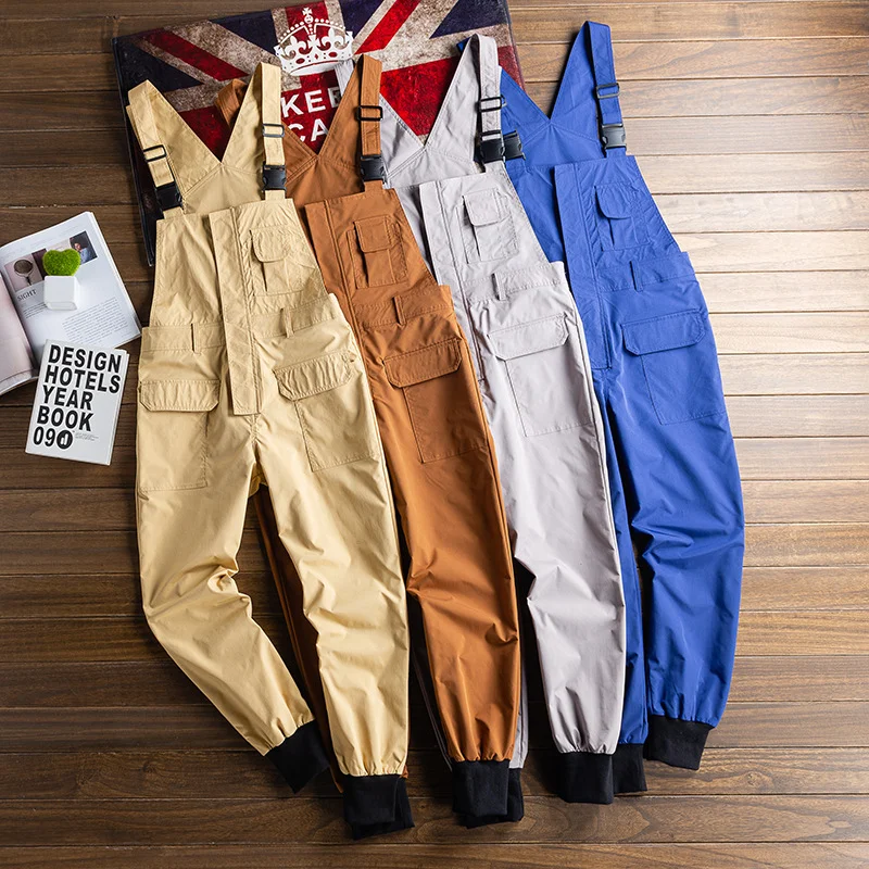 

Safari Style Pockets Overall Lovers Streetwear Work Cargo Pants Jumpsuit Men Dungarees Baggy Trousers Hip Hop Strap Pants 5XL