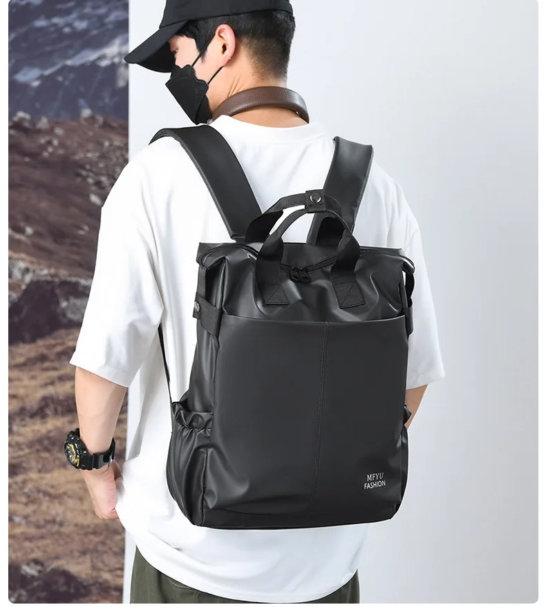ผู้ชาย PU ฟิล์มกระเป๋าเป้สะพายหลังธุรกิจท่องเที่ยวแบบพกพาเดินทางไปทํางานกระเป๋าเป้สะพายหลัง High-end กันน้ําคอมพิวเตอร์กระเป๋านักเรียน
