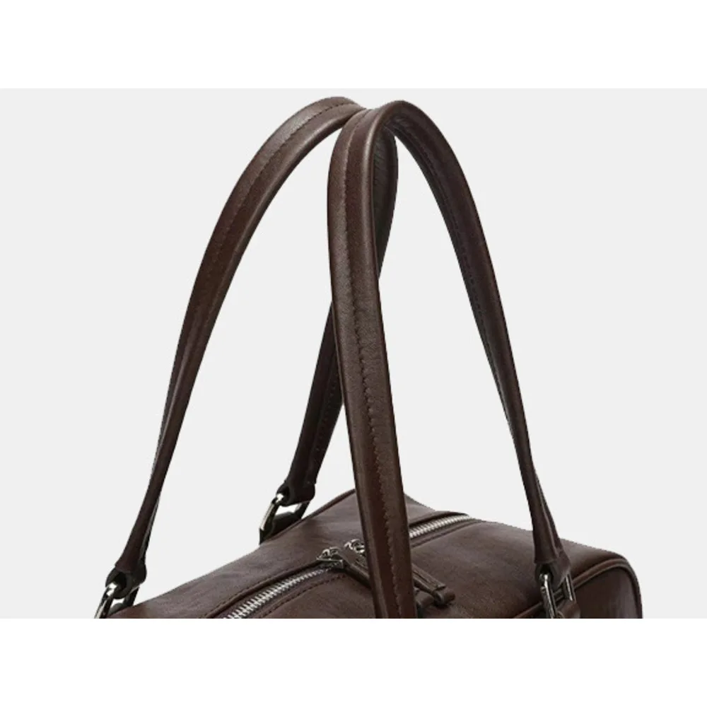 Boston 2024 new multi pocket niche leather motorcycle women's large capacity single shoulder armpit bag_voghion.com