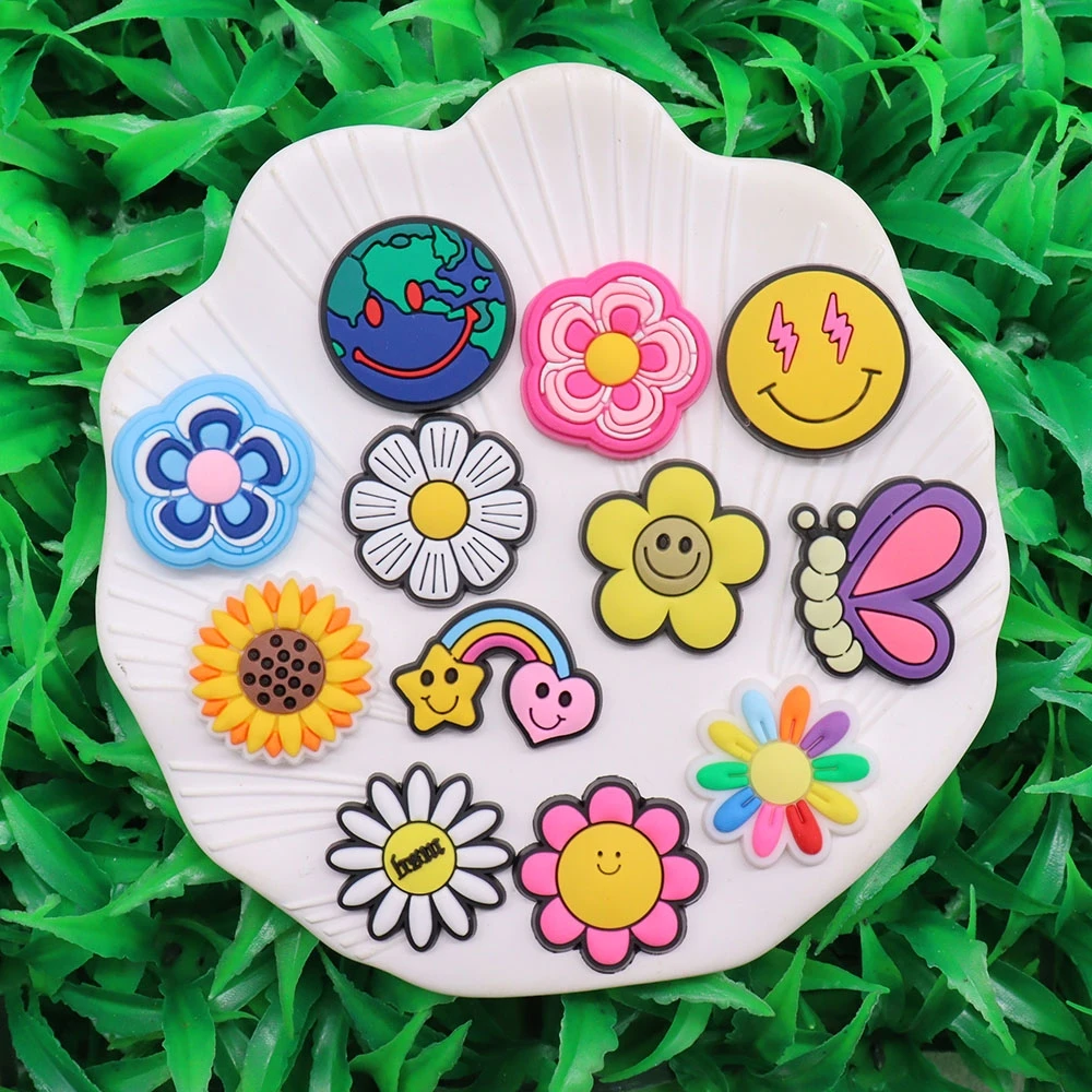 https://ae01.alicdn.com/kf/S5933184d62af41b497f977732a3ab1efR/Hot-Sale-1-12pcs-PVC-Shoe-Charms-Flower-Daisy-Sunflower-Earth-Accessories-Shoe-Decorations-For-Croc.jpg