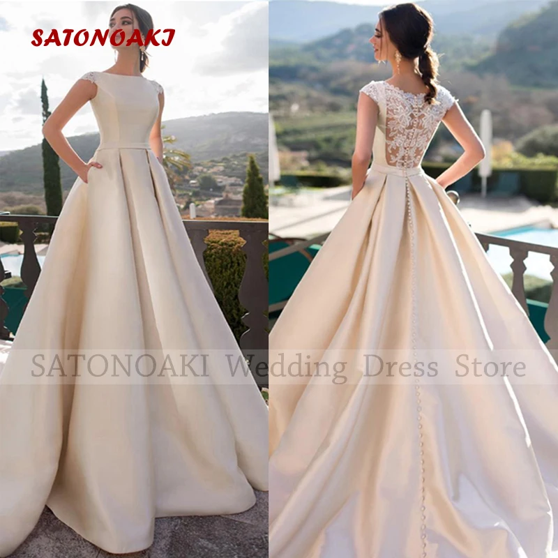 

Elegant Boho Scoop Neck Cap Sleeves Satin Wedding Dress for Women A-Line Sweep Train Bride Gown with Pockets Vestido De Novia