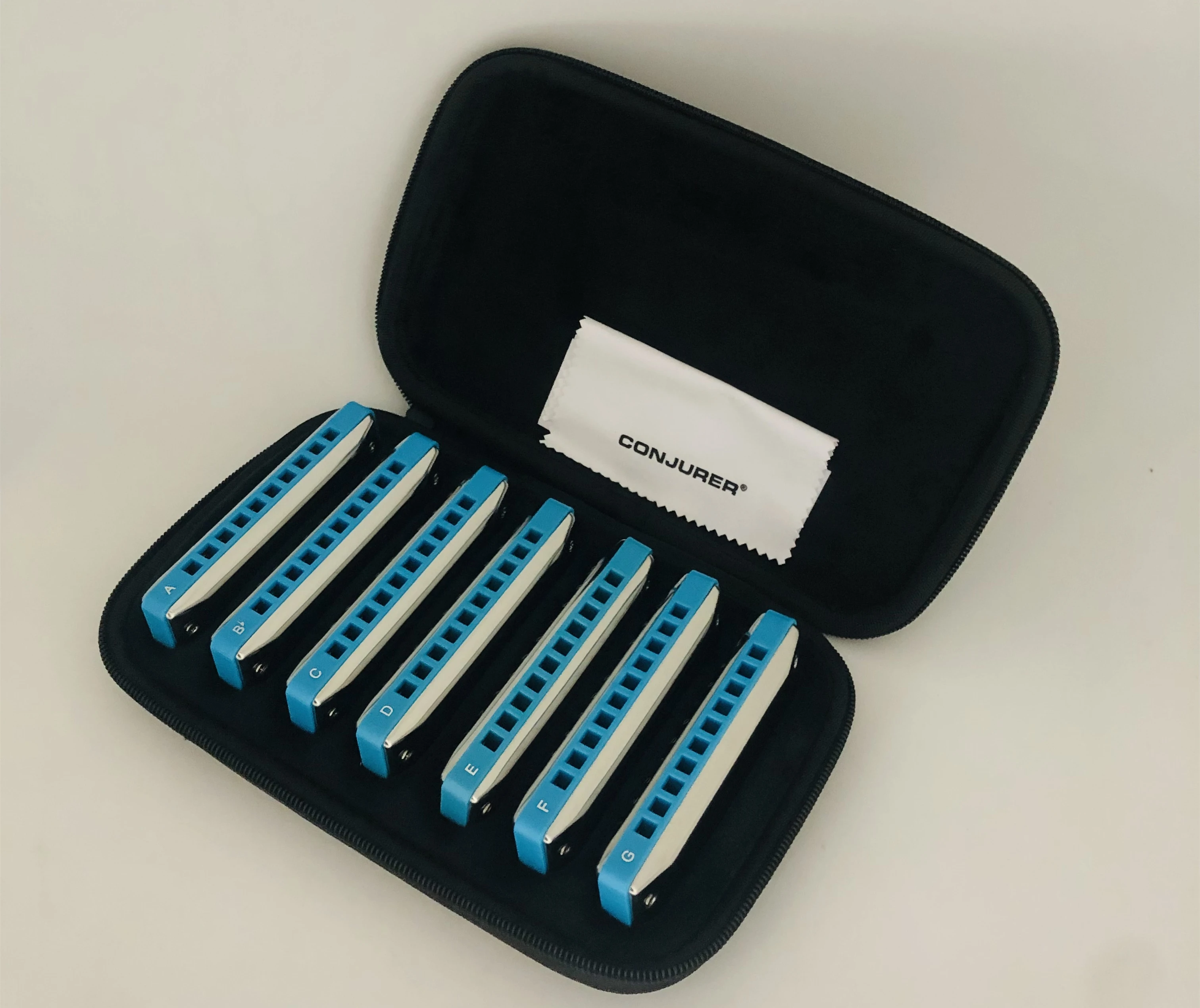 Description Picture 2 of itemConjurer blues harp 10 hole harmonica set with 7 keys for player beginner professional