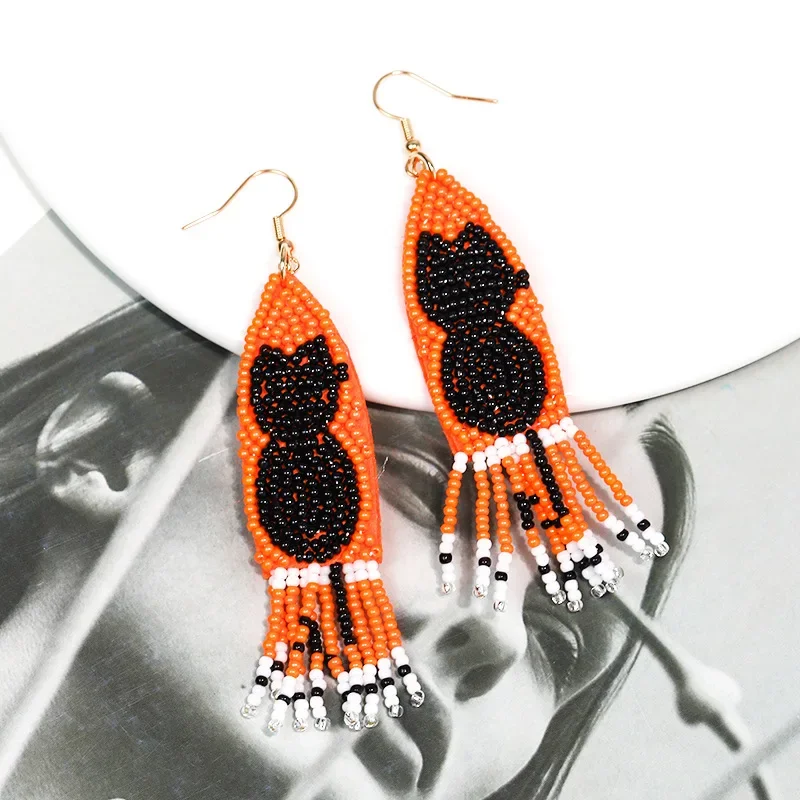 

Beaded earrings Black Cat Creative ' Play tricks Originality Tide Hand knitting Bohemia Alloy All Saints' Day Rice bead earrings