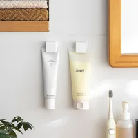 1-100PCS Pieces Toothpaste Holder No Punch Facial Wash Holder Bathroom Wall Mounted Multifunctional Toothpaste Holder 2