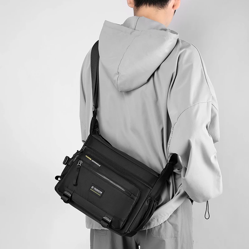 Large capacity nylon cross body bag | adjustable shoulder strap, zipper closure, water bottle rack, very suitable for business t