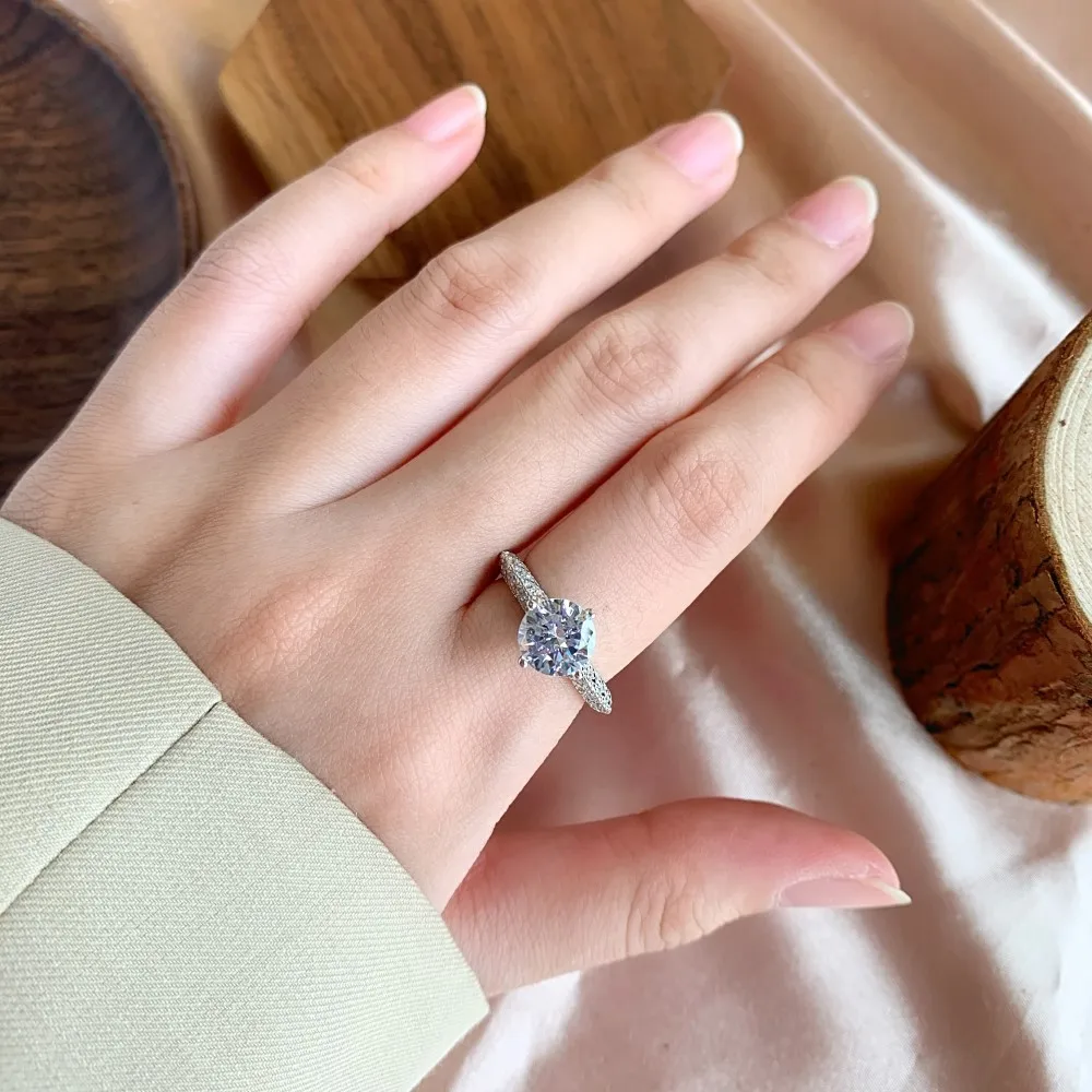 A Closeup of a Diamond Engagement Ring on a Females Finger Stock Photo -  Image of engaged, diamond: 255086128