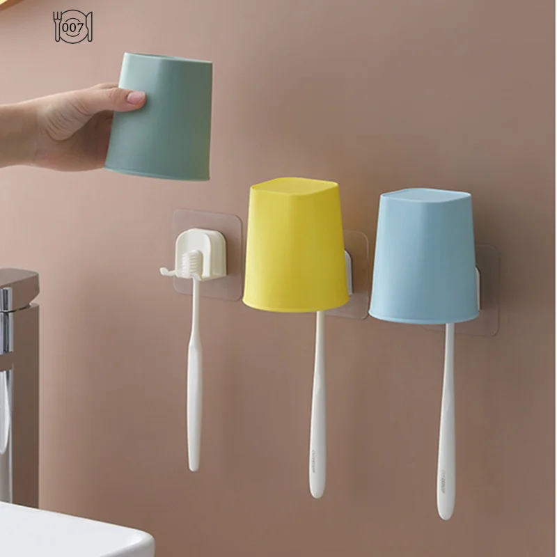 Wall-mounted Toothbrush Holder Mouthwash Cup Bathroom Punch-Free Tooth Cup Rack Household Storage Organizer Bathroom Accessories