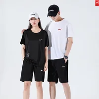 Nike Sports Suit Men and  Women  Embroidered  Couple  Cotton  Athletic  Short  Sleeved  Shorts  Set  White and Black 4