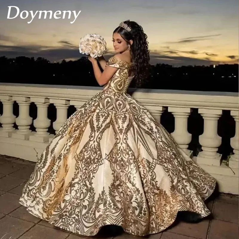 

Doymeny Women’s Shining Gold Quinceanera Dresses Sequined Princess Beaded Off Shoulder Ball Gown Vestidos de 15 Años Sweet 16