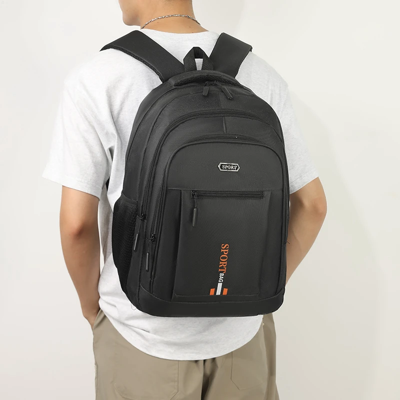 Large-capacity laptop bag with adjustable shoulder strap and trolley sleeve, durable nylon lining, and zipper closure