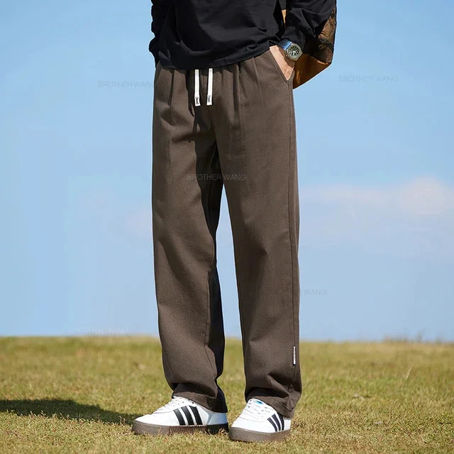 thumbnail image 1 of Pantalones casuales rectos de algodón elásticos para hombre, de estilo clásico, de primavera, para exteriores, de moda coreana, cómodos, de color caqui liso, holgados, 1 of 5