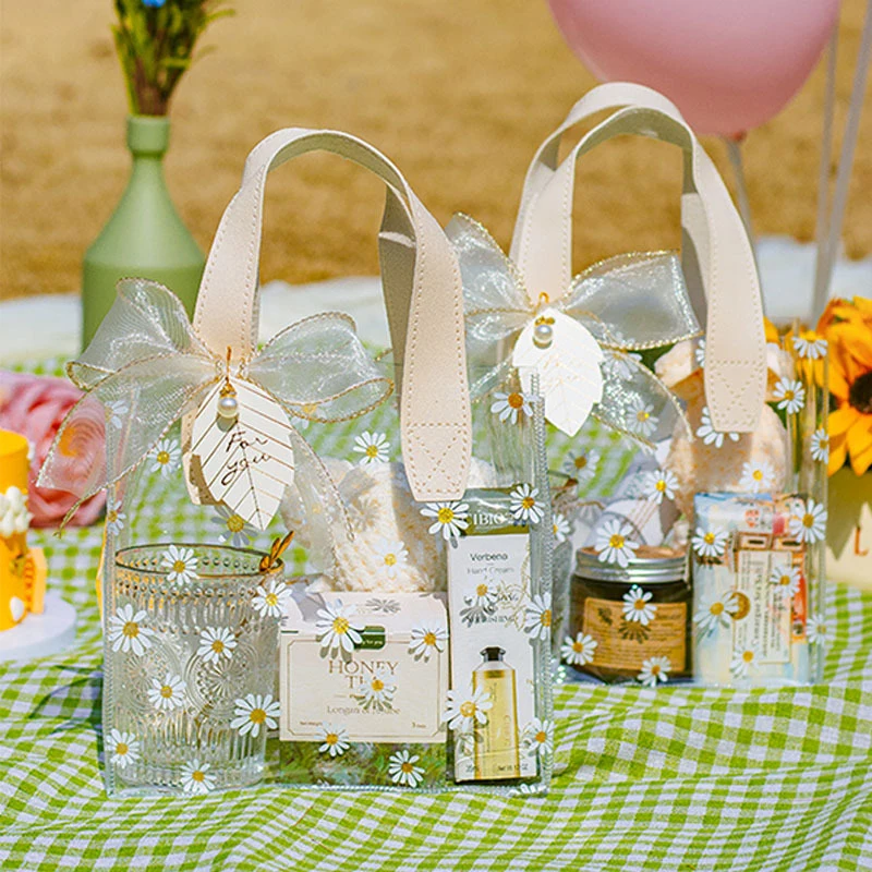 https://ae01.alicdn.com/kf/S5a5a962c912a4d5197d552c5bcccea59e/Transparent-Tote-Bags-Daisy-Gift-Bag-PVC-Plastic-Birthday-Gift-Boxes-Upscale-Cute-Print-Hand-Bags.jpg