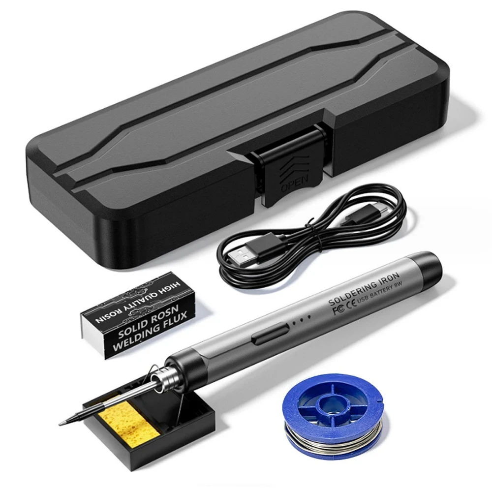 Fer à souder portable USB rechargeable 800mAh posé sur une table avec câble Type-C et embouts de rechange