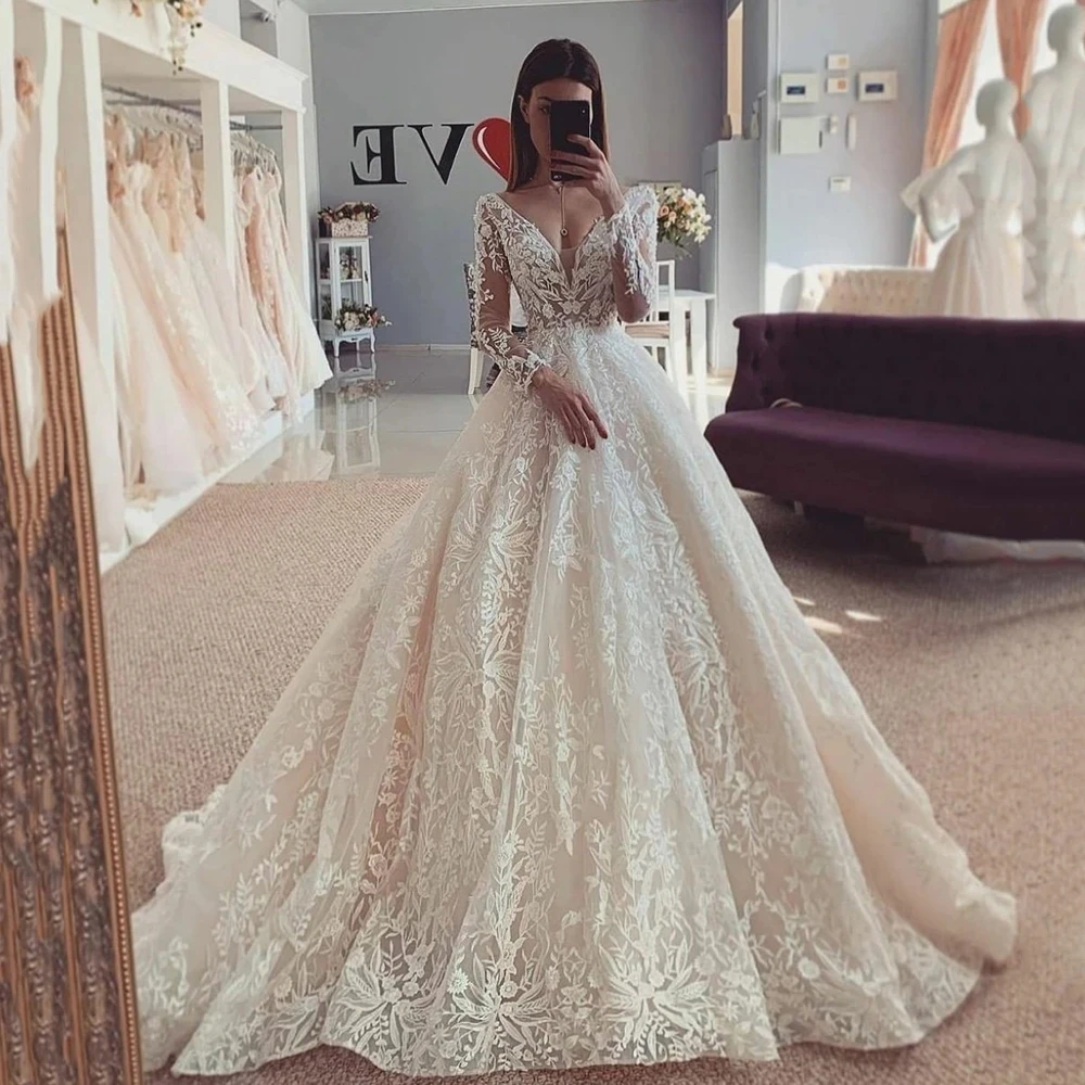 Sexy Bodycon Mermaid Wedding Dresses Transparent Back Long Sleeves Boho Bridal Gowns Appliques Lace Tulle V-Neck