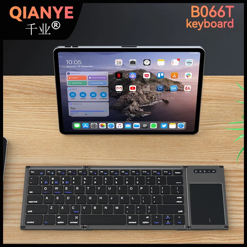 

Qianye B066T Big Touch mute mini seamless splicing portable computer phablet folding Bluetooth keyboard
