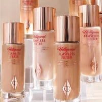 Charlotte Tilbury CT Highlighter Foundation : Poudre compacte hydratante et illuminatrice pour un maquillage longue tenue 1