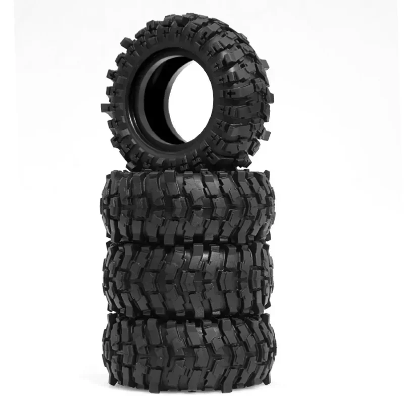 Quatre pneus crawler RC 1.9 en caoutchouc haute qualité alignés, prêts à être montés sur un essieu de 1/10 ou 1/12.