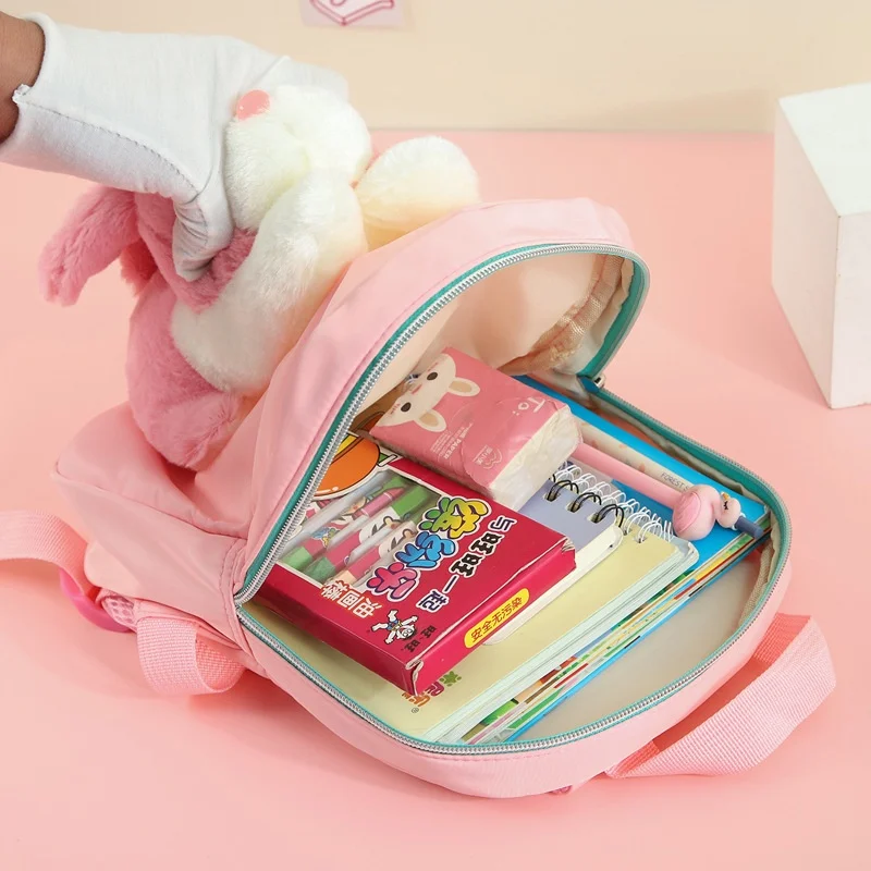 Рисунок 5 - Милые маленькие рюкзаки с куклой