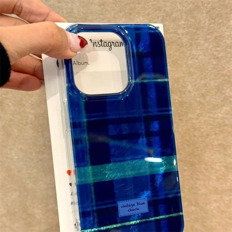 Whirlpool Klein Blue Grid Phone Case with Plush Ball Chain Accessory