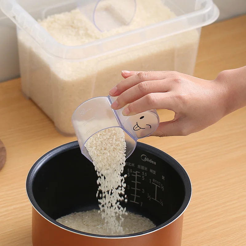 https://ae01.alicdn.com/kf/S5adc26f60dc2487499097aeffaddde883/Cartoon-Cute-Two-In-One-Liquid-Measuring-Cup-Scoop-Rice-Cup-With-Scale-Home-Kitchen-Flour.jpg