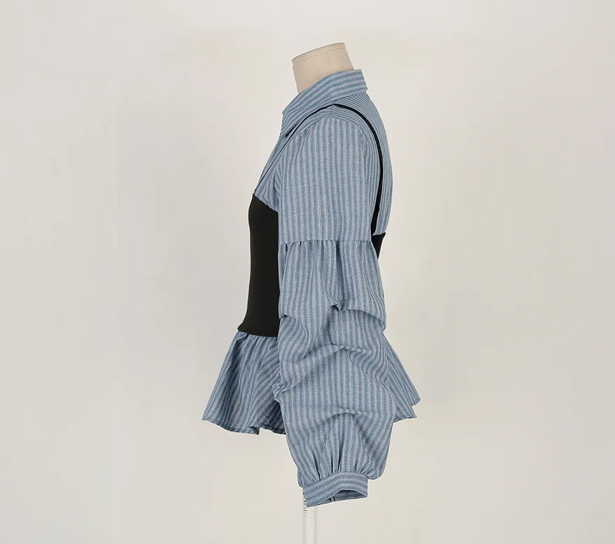 قميص نسائي جديد لربيع 2026 بتصميم مخطط يحدد الخصر وقصة ضيقة مع تصميم كم منفوش وهمي من قطعتين