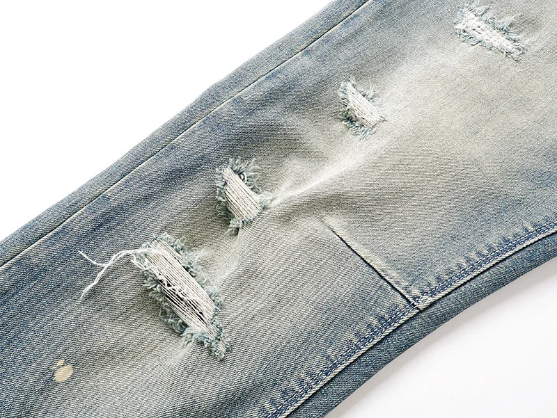 بنطلون جينز رجالي ضيق من ماركة RTA بتصميم ممزق ومزين بالرسم والجرافيتي، بنطلون طويل للشارع