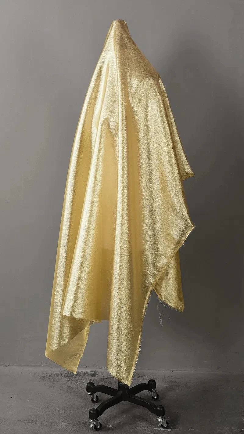 Radiant Golden Silk-Blend Reflective Stage Wear Fabric