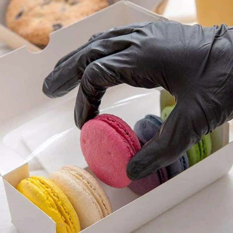 Lot de 20 paires de gants nitrile jetables professionnels jaunes et bleus, conditionnés en boîte ouverte.