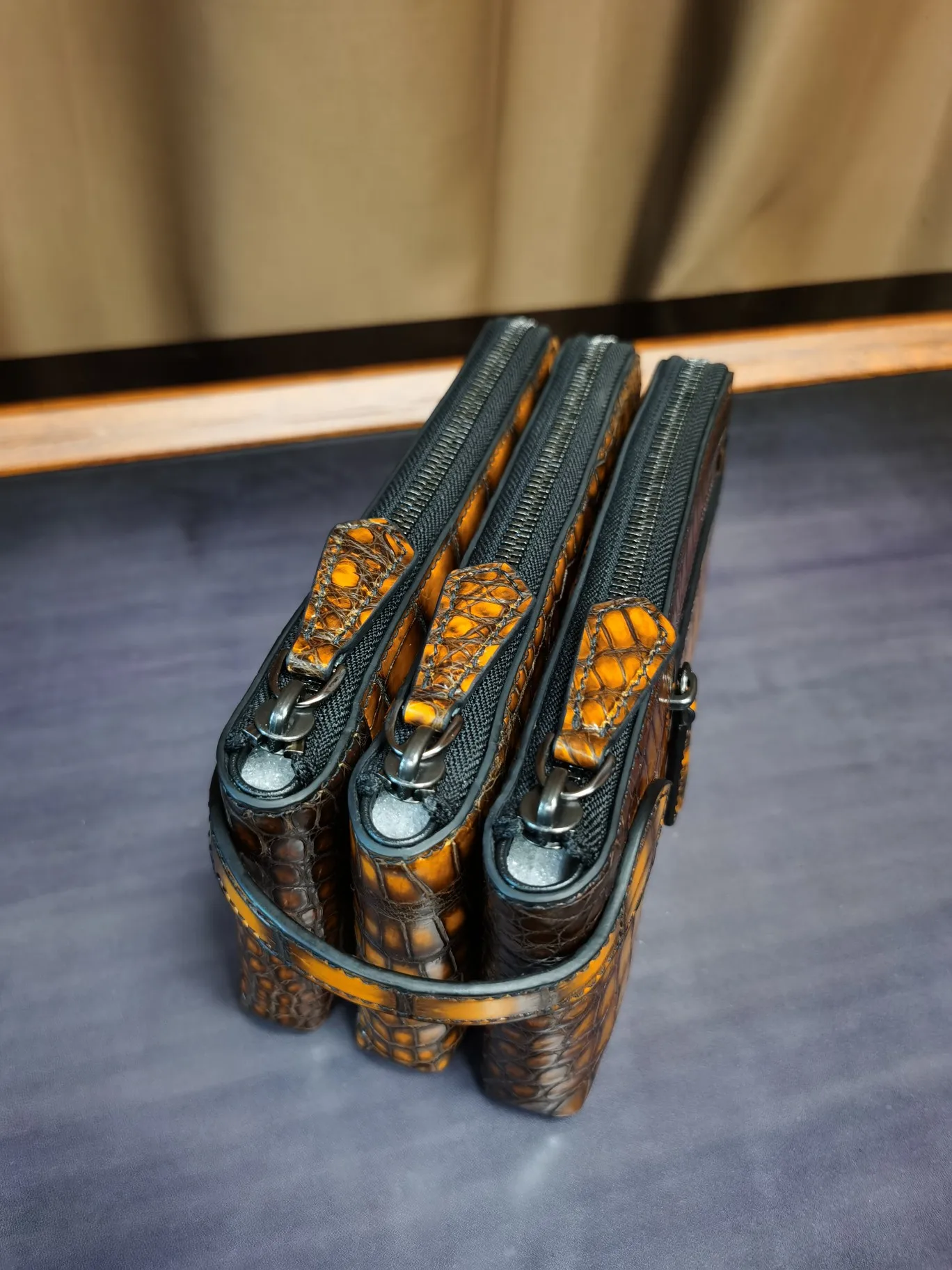 Рисунок 4 - Мужские кошельки в стиле ретро из крокодиловой кожи