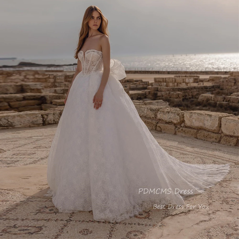 

Sexy A Line Arabic Beach Wedding Dresses Modest Lace Bow Bridal Gowns Princess Sweetheart Long Train Elegant Classic Bride Dress
