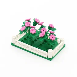 Enhance your creativity with the MOC Creative Garden, featuring a vibrant array of cacti, tulips, sunflowers, and vine flowers. Designed for intricate plant construction using small building blocks. (Cherry blossom)