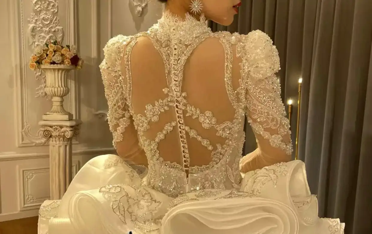 Рисунок 3 - Женское свадебное платье с длинным рукавом