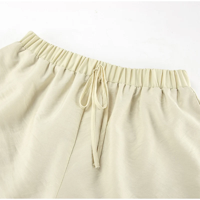 Conjunto de 2 piezas de pantalones cortos holgados con volantes para mujer, cuello en V, camisas caladas, pantalones cortos de pierna ancha, traje blanco para primavera y verano 2025.